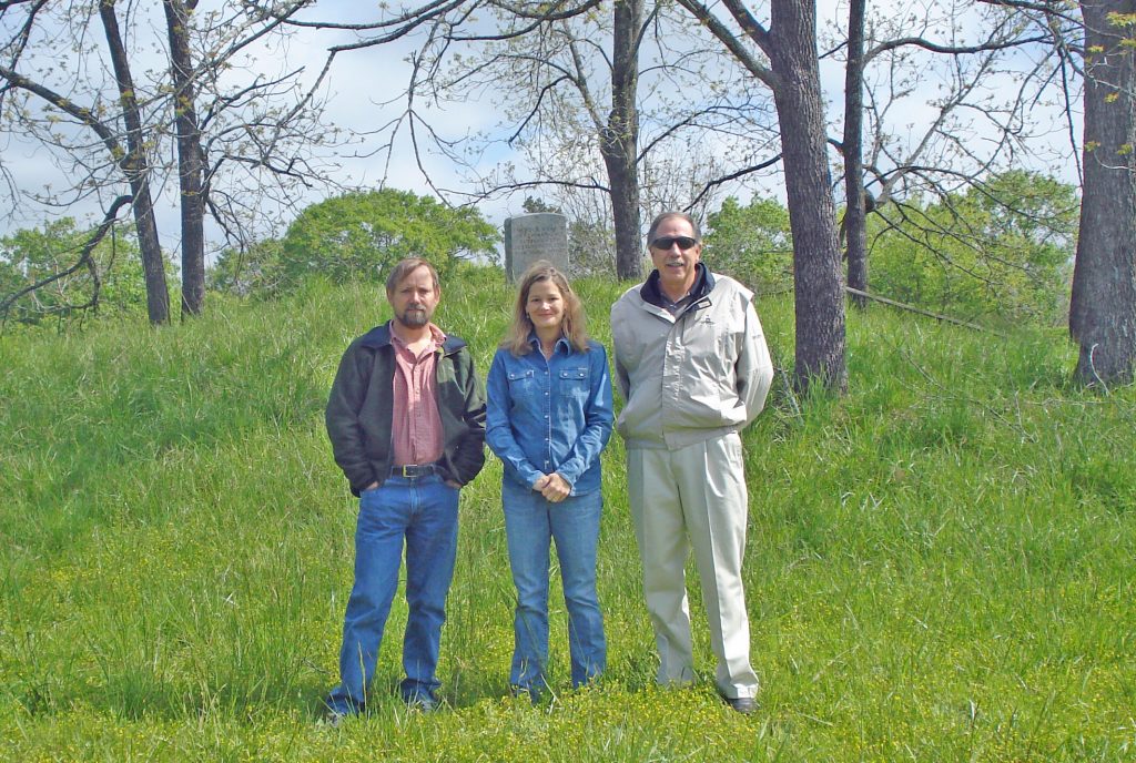 Archaeologist Evan Peacock, SE Regional Director Jessica Crawford and former site owner Larry Tabor at Lyon's Bluff Mound in Mississippi. Photo credit: Jessica Crawford
