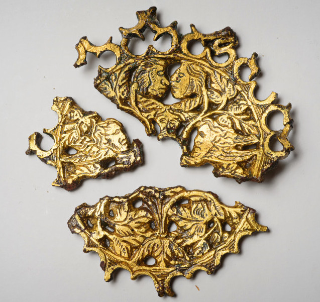 A European gold-plated brass cover for a wheel lock pistol depicting Adam and Eve. Credit: Patrick hall