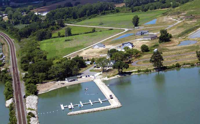 An aerial view of the Danbury site. The new preserve is the open field to the right of the houses. Credit: Gregory Spatz.