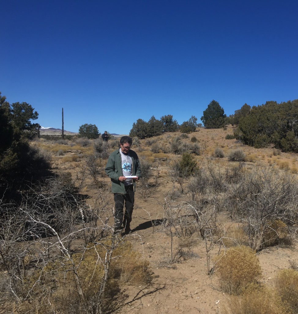 Jim Walker, Southwest Regional Director, stands in what archaeologist suspect is one of two large great kivas on the site.