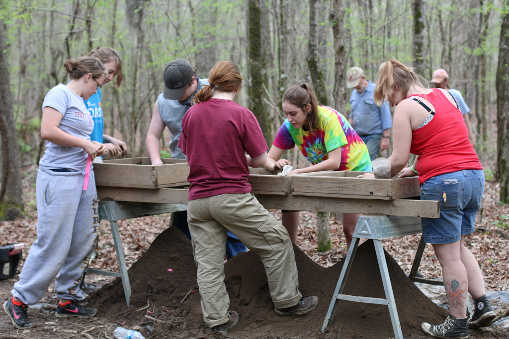 Troy State University students screen soil from test units at the Holy Ground site. Credit: Paul Willis, University of South Alabama