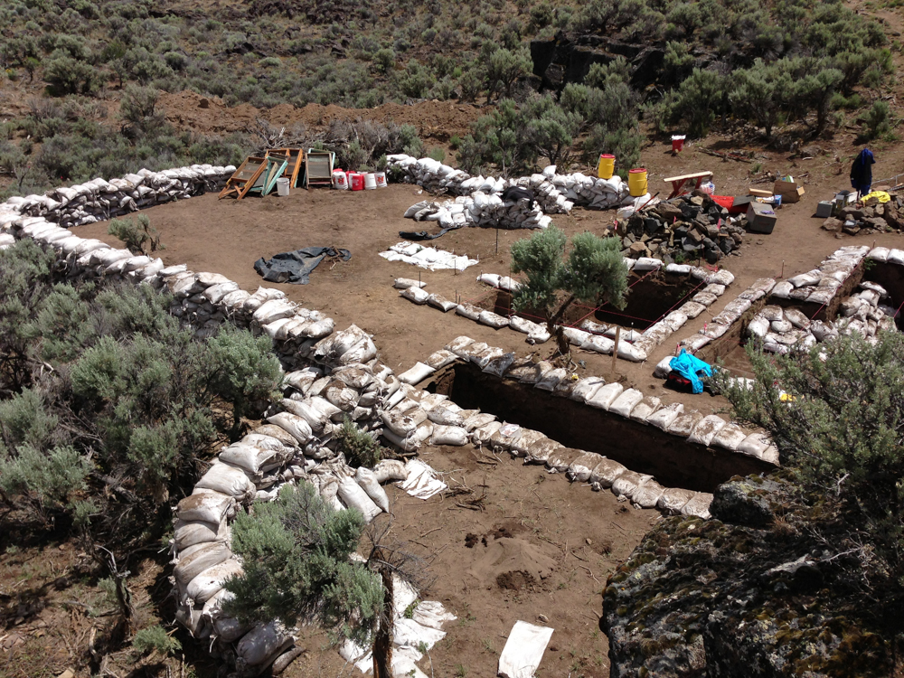 Overhead photo of an excavation site ringed with sandbags.